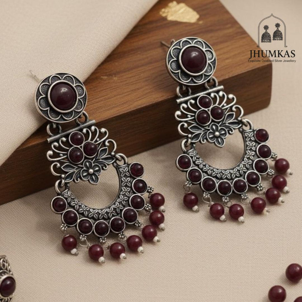 Deep Ruby Chandbali Jhumkas
